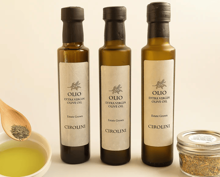 Three bottles of Cirolini Olive Oil