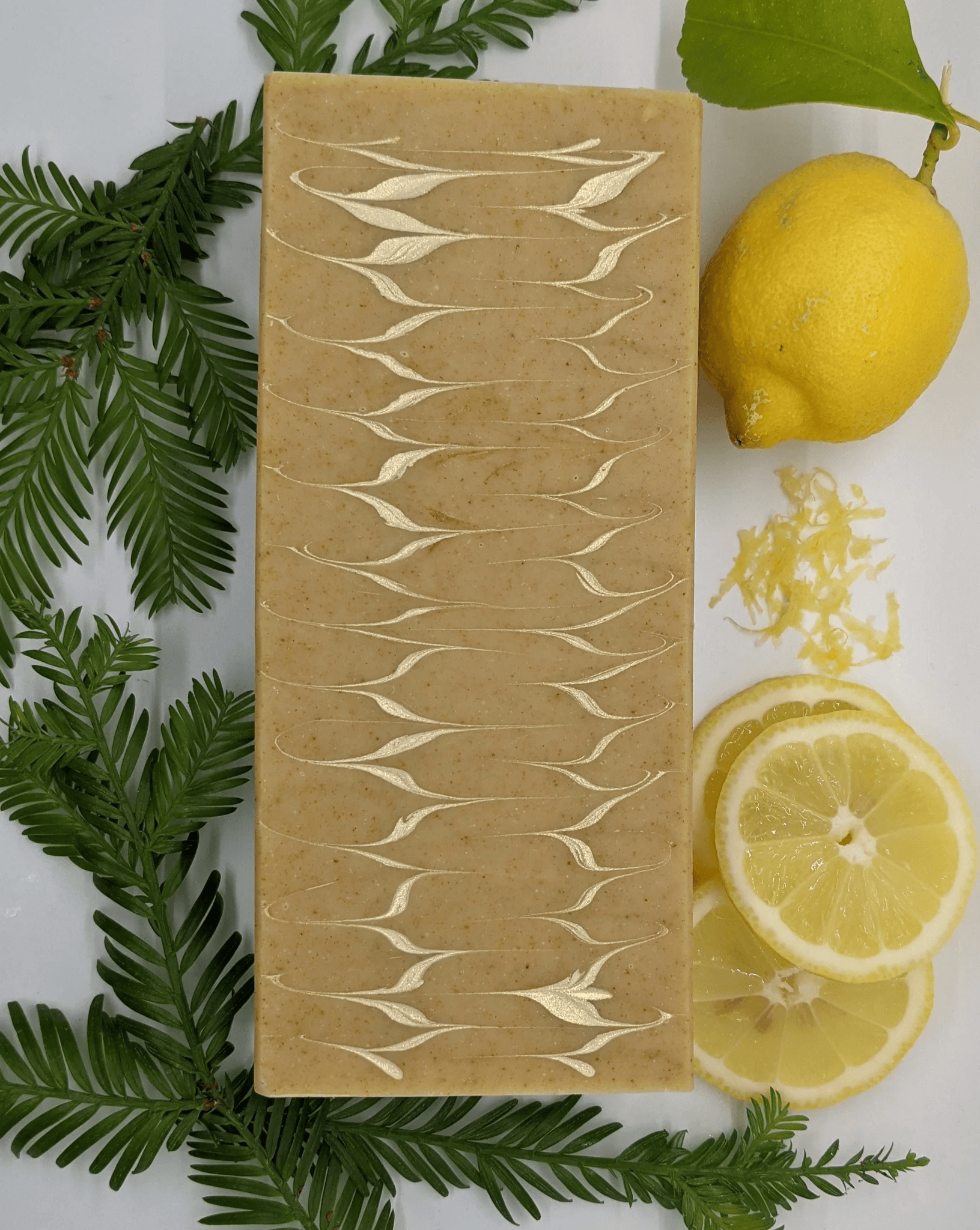 A bar of lemon-scented soap from Redwood Soaps and a lemon