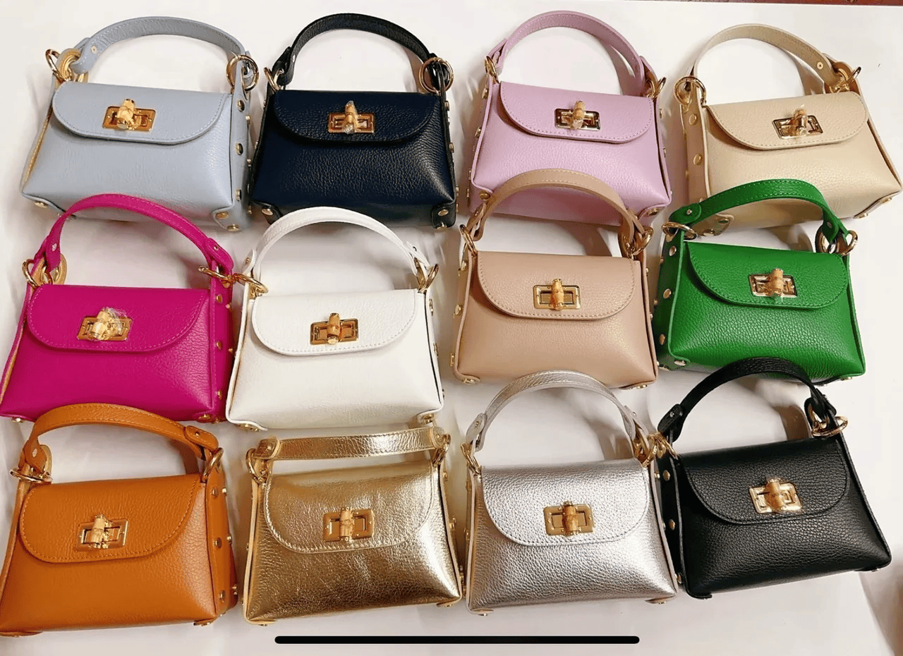 One dozen small handbags in an assortment of colors