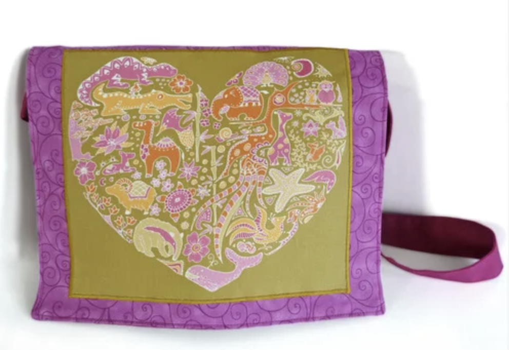 pink and yellow bag with heart pattern