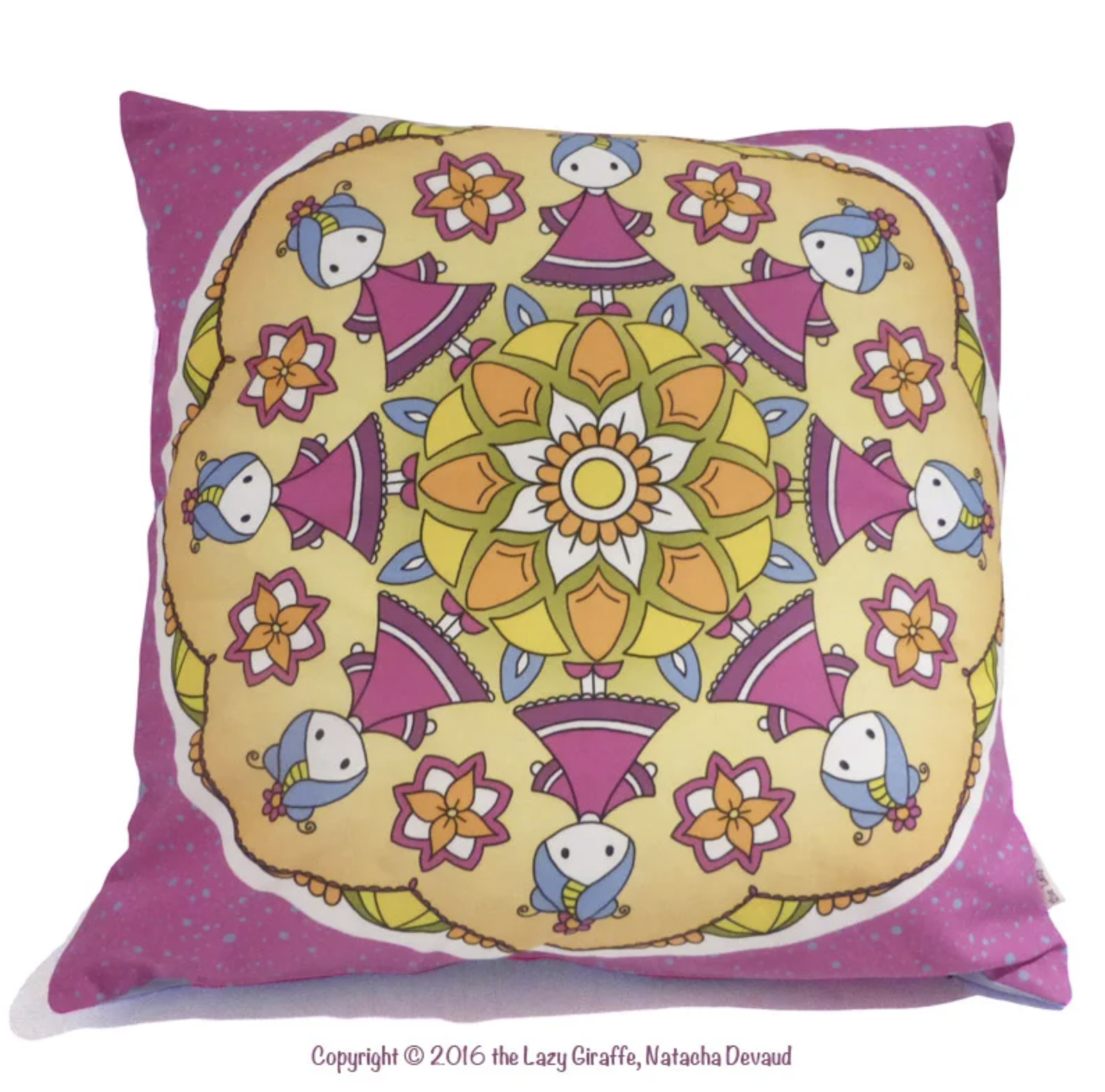 pink and yellow pillow with mandala pattern